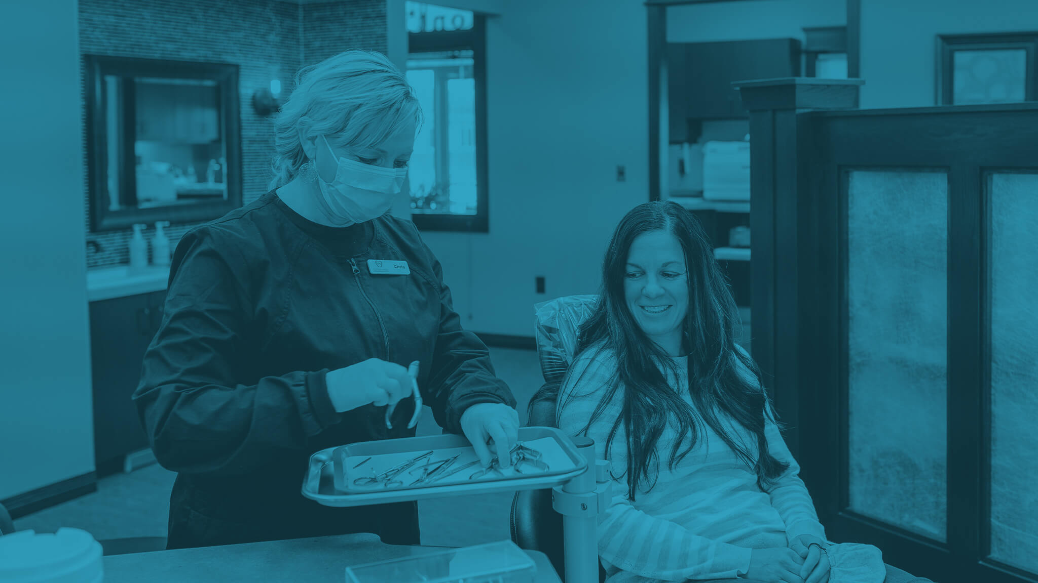 orthodontist working on patient