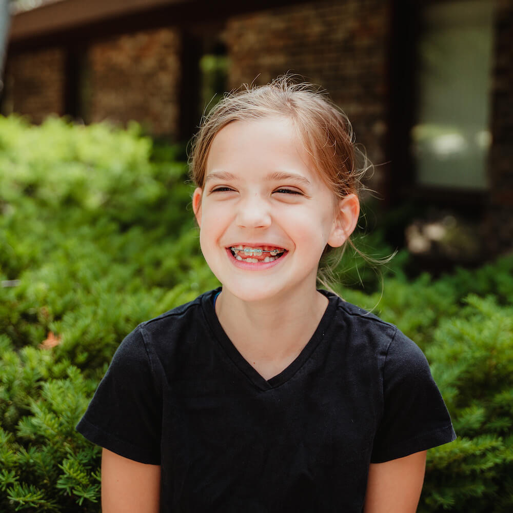 young girl with braces