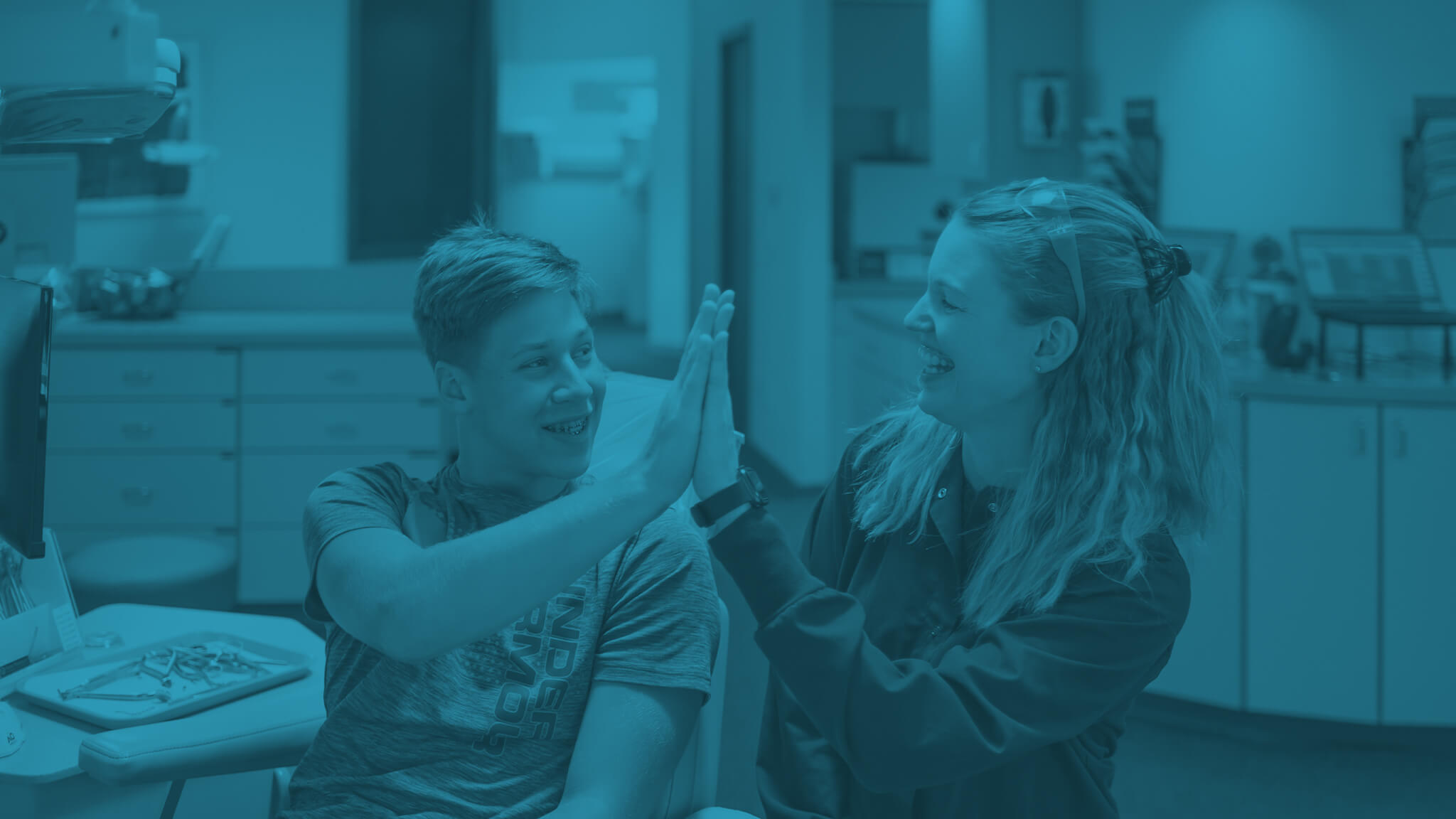 patient giving high five to staff