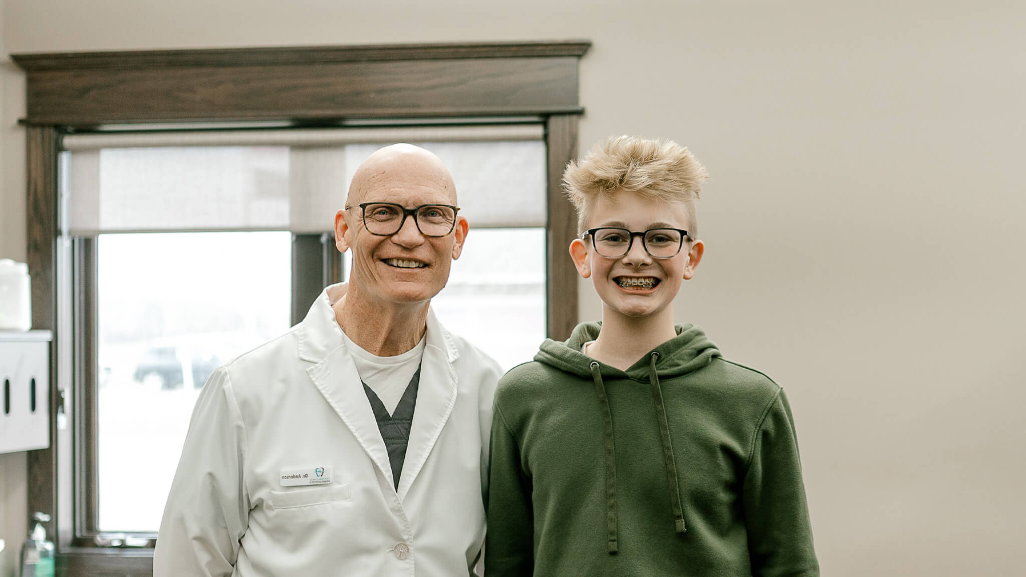 dr. anderson with patient smiling